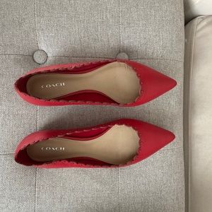 Scalloped red Coach flats
